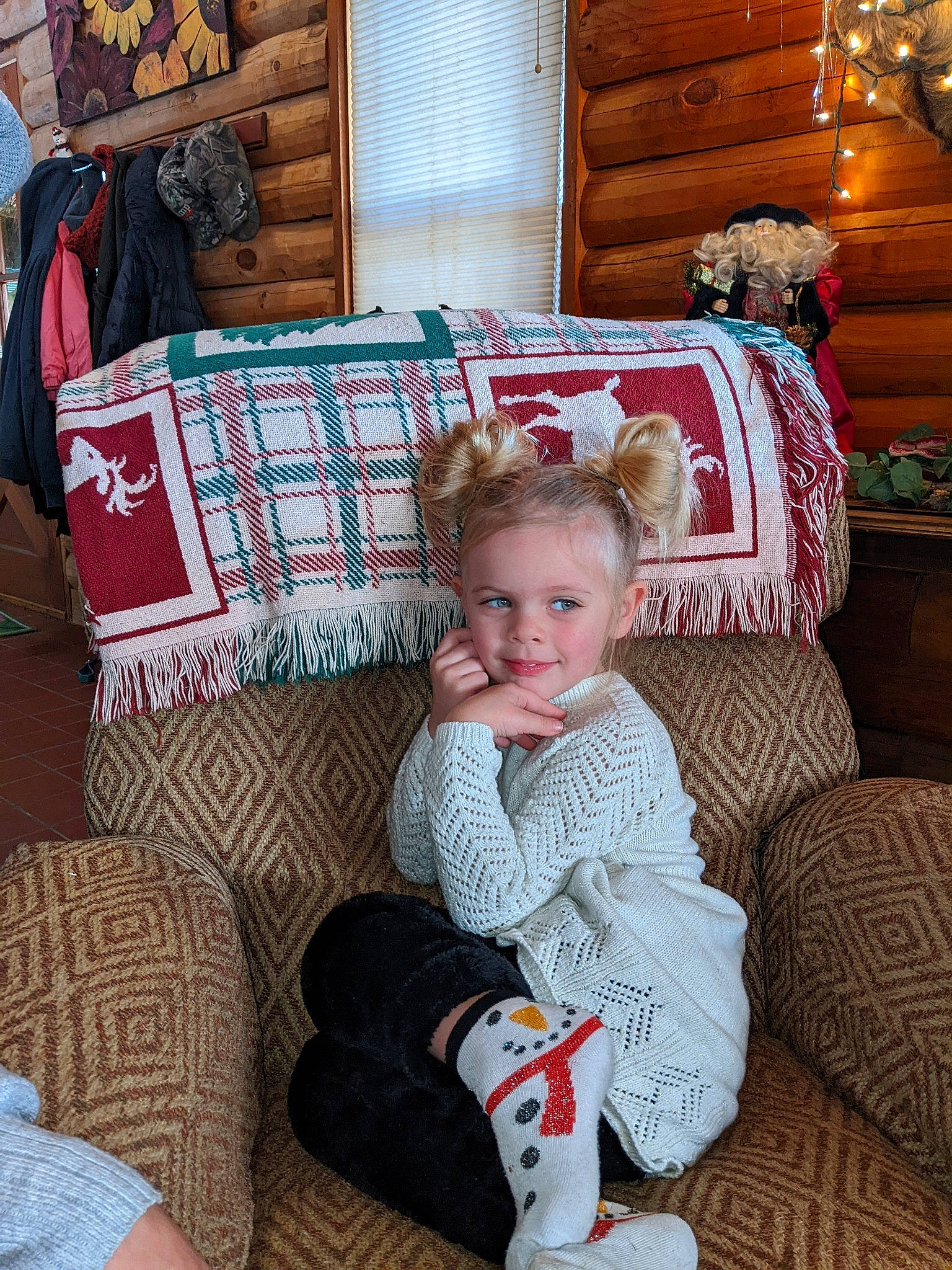 Kambry is registered to the contest to win money with this photo: baby_toddler_clothing, child, christmas, christmas_eve, comfort, couch, event, holiday, home, joy, lap, living_room, mammal, person, room, sitting, smile, sofa_bed, throw_pillow, toddler
