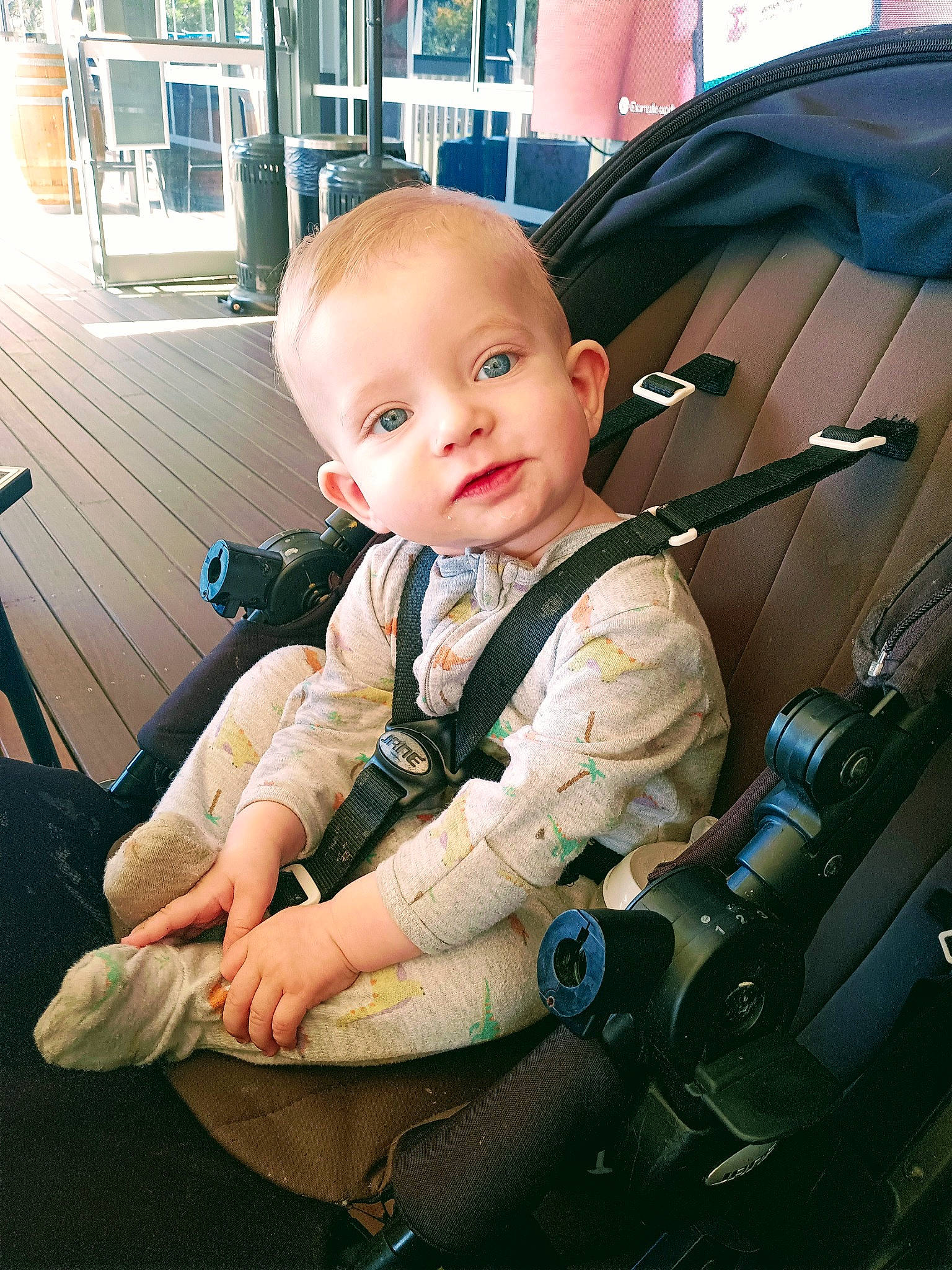 Tommy Jay is registered to the contest to win money with this photo: baby, baby_carriage, baby_products, baby_safety, baby_toddler_clothing, cheek, child, comfort, cool, fun, grass, hairstyle, lap, mammal, motor_vehicle, person, sitting, standing, toddler, vehicle_door
