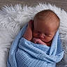 baby, blanket, blue, child, cute, fluffy, hand, head, indoors, infant, newborn, peaceful, portrait, resting, rug, skin, sleeping, soft, white, wrapped