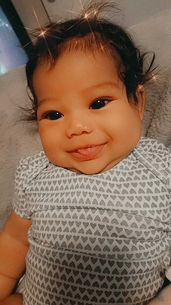 Lyra joined the competition — help win amazing prizes! baby, baby_toddler_clothing, brown_hair, cheek, child, close_up, eye, eyebrow, eyelash, forehead, hair, happy, iris, joy, lip, nose, person, skin, sleeve, smile