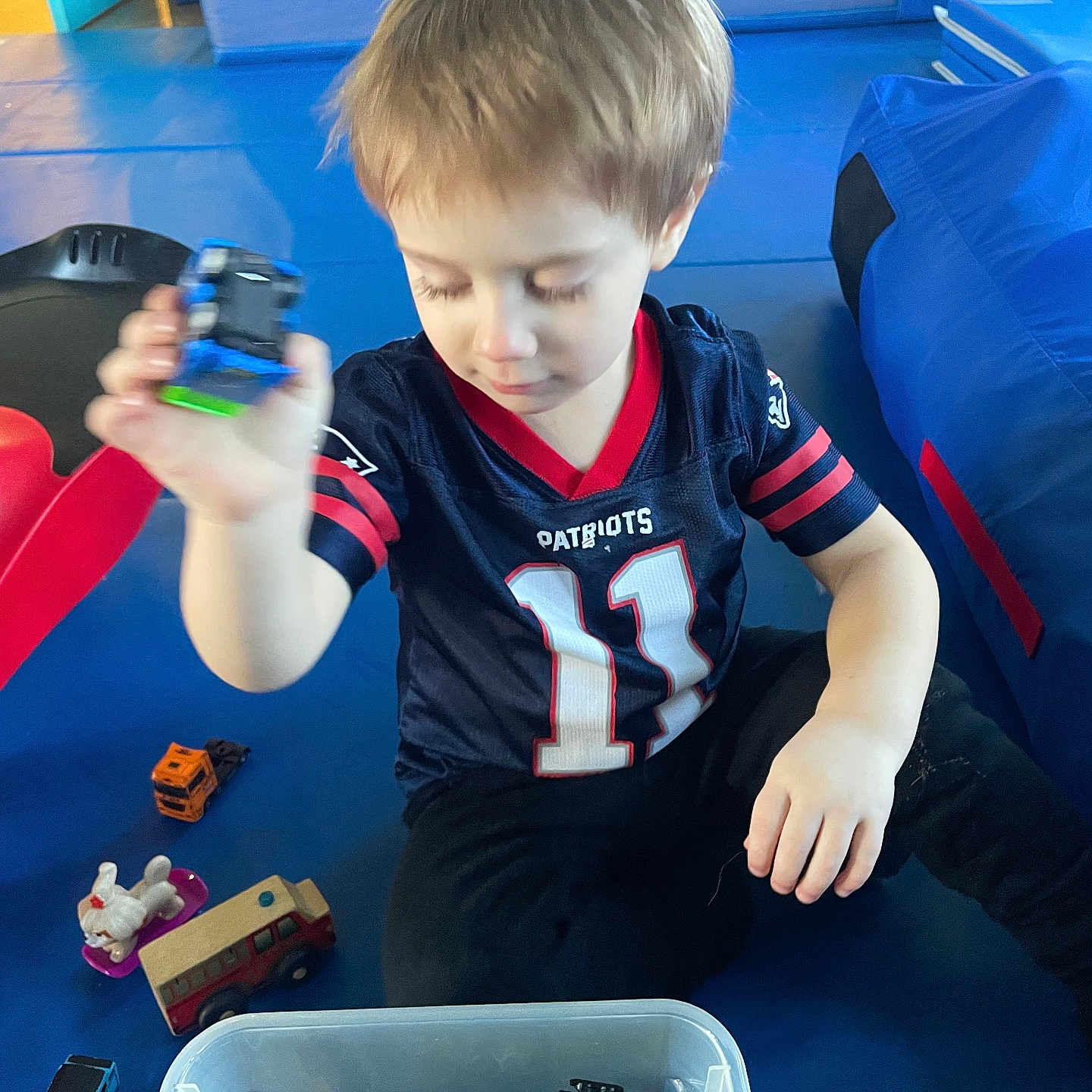 Elijah joined the competition — help win amazing prizes! bodypart, box, boy, child, clothing, electronics, face, finger, hand, head, machine, male, mobilephone, person, phone, photography, portrait, t_shirt, toy, wheel