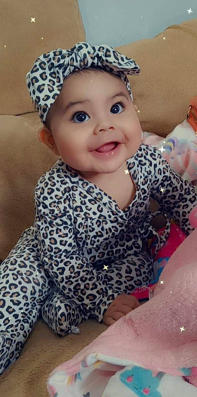 Gianna is registered to the contest to win money with this photo: baby, baby_toddler_clothing, cap, cheek, cool, costume_hat, eye, happy, head, headgear, headpiece, headwear, iris, joy, lip, pattern, person, pink, skin, sleeve