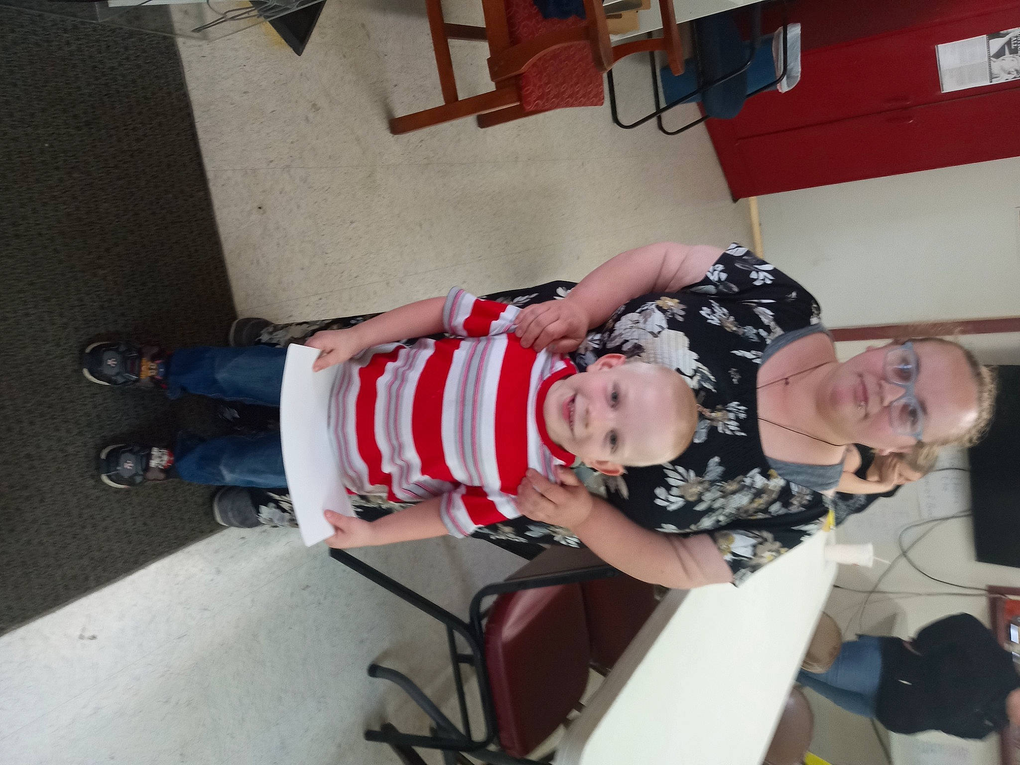 Adam is registered to the contest to win money with this photo: baby, baby_toddler_clothing, child, comfort, elbow, fun, human_leg, joint, joy, knee, lap, person, room, thigh, toddler, walking_shoe, wrist