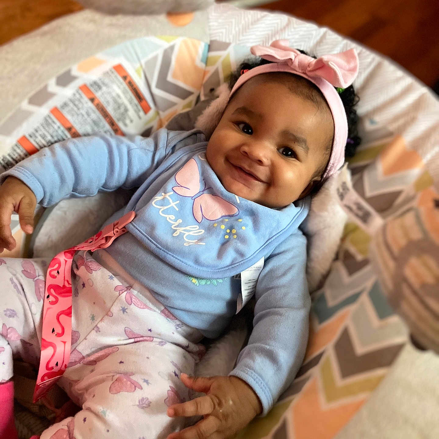 Samantha joined the competition — help win amazing prizes! baby, babylaughing, bonnet, clothing, cushion, face, furniture, happy, hat, head, homedecor, laughing, newborn, pajamas, pants, person, photography, portrait, sitting, smile