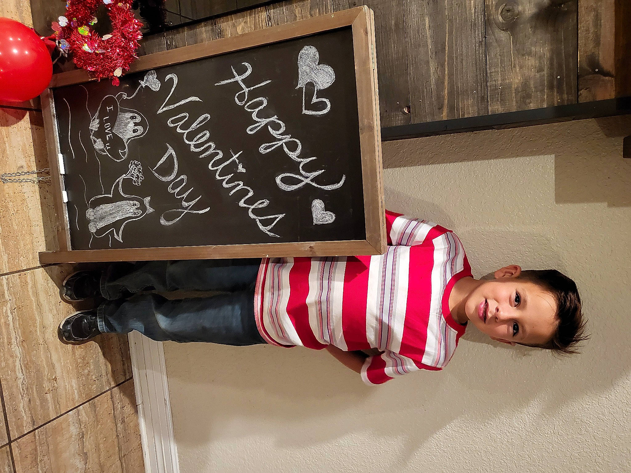 Xaiden joined the competition — help win amazing prizes! advertising, balloon, blackboard, chalk, elbow, fashion_accessory, font, handwriting, joy, magenta, pattern, person, rectangle, red, room, sitting, slate, sleeve, street_fashion, wood