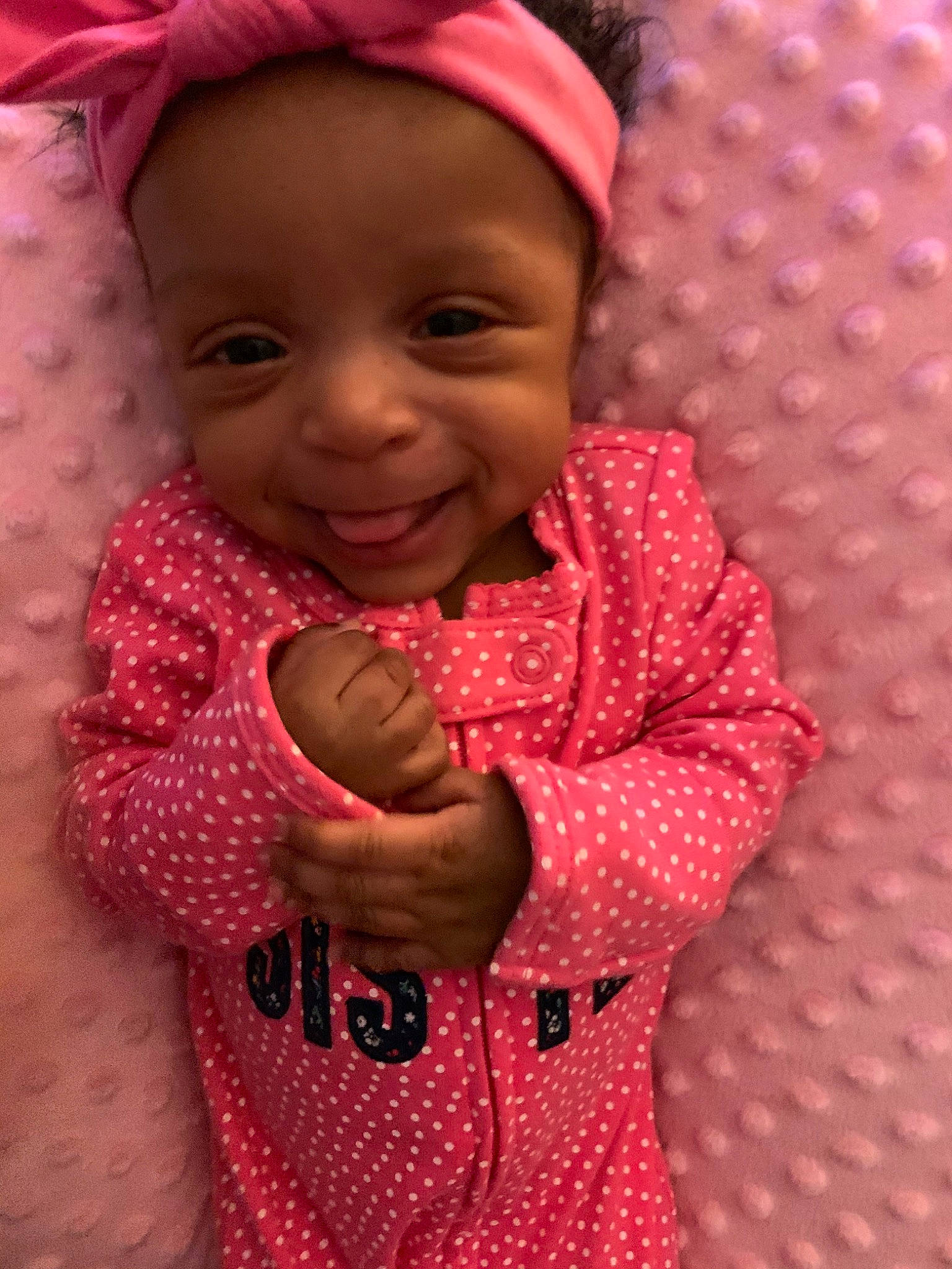 Maziyah is registered to the contest to win money with this photo: baby, cheek, child, design, joy, lip, magenta, pattern, person, pink, polka_dot, skin, smile, toddler