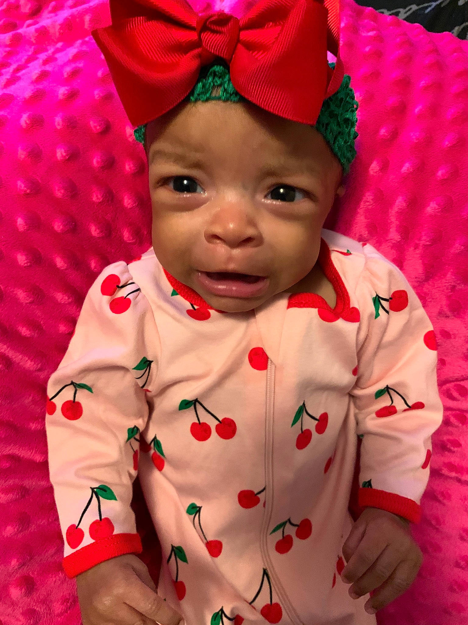 Taziyah is registered to the contest to win money with this photo: baby, baby_toddler_clothing, cheek, child, costume, hair_accessory, head, headgear, lip, person, pink, red, smile, toddler