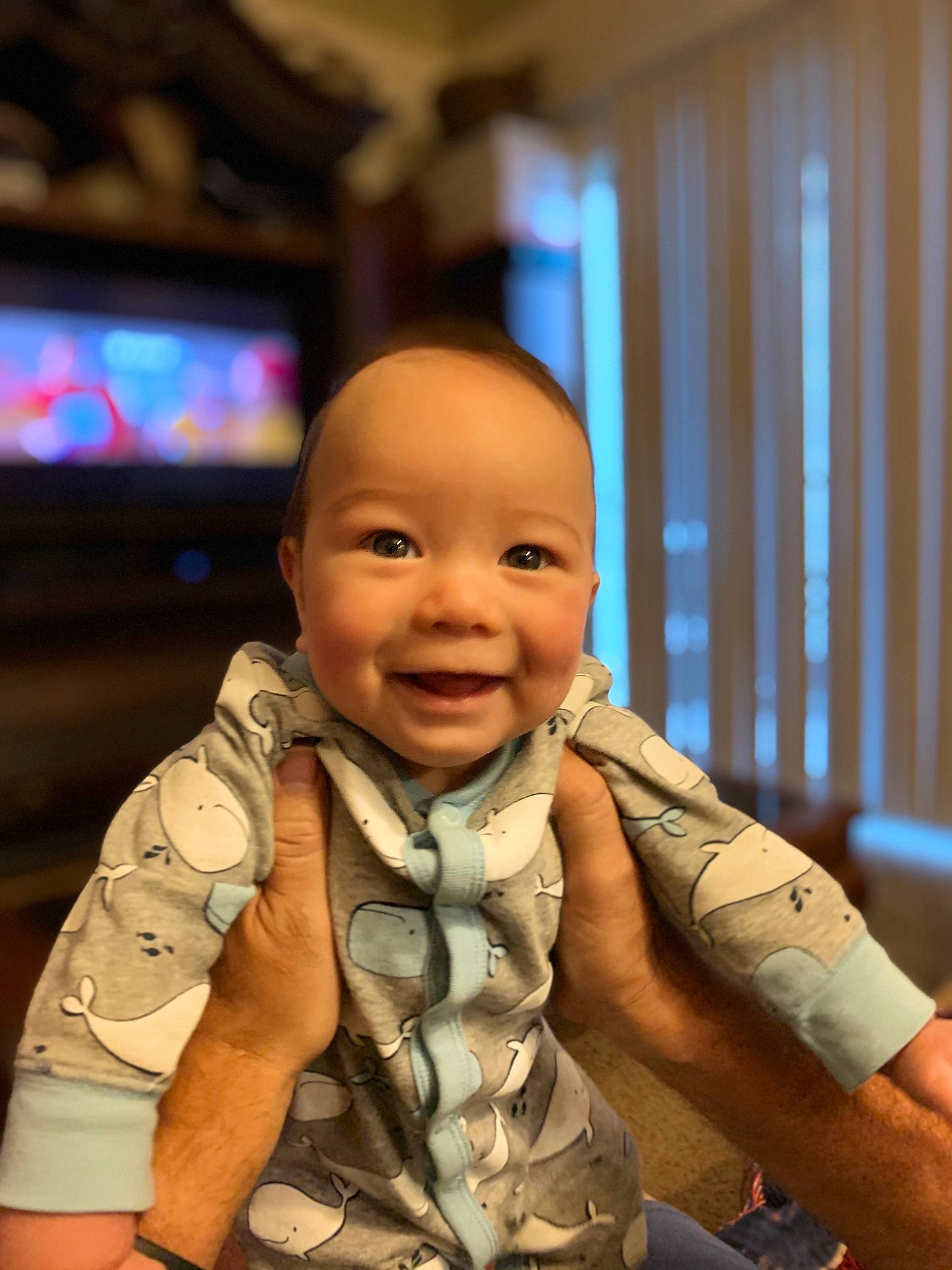 Todd is registered to the contest to win money with this photo: baby, cheek, child, chin, face, facial_expression, fun, head, joy, person, sitting, skin, smile, toddler