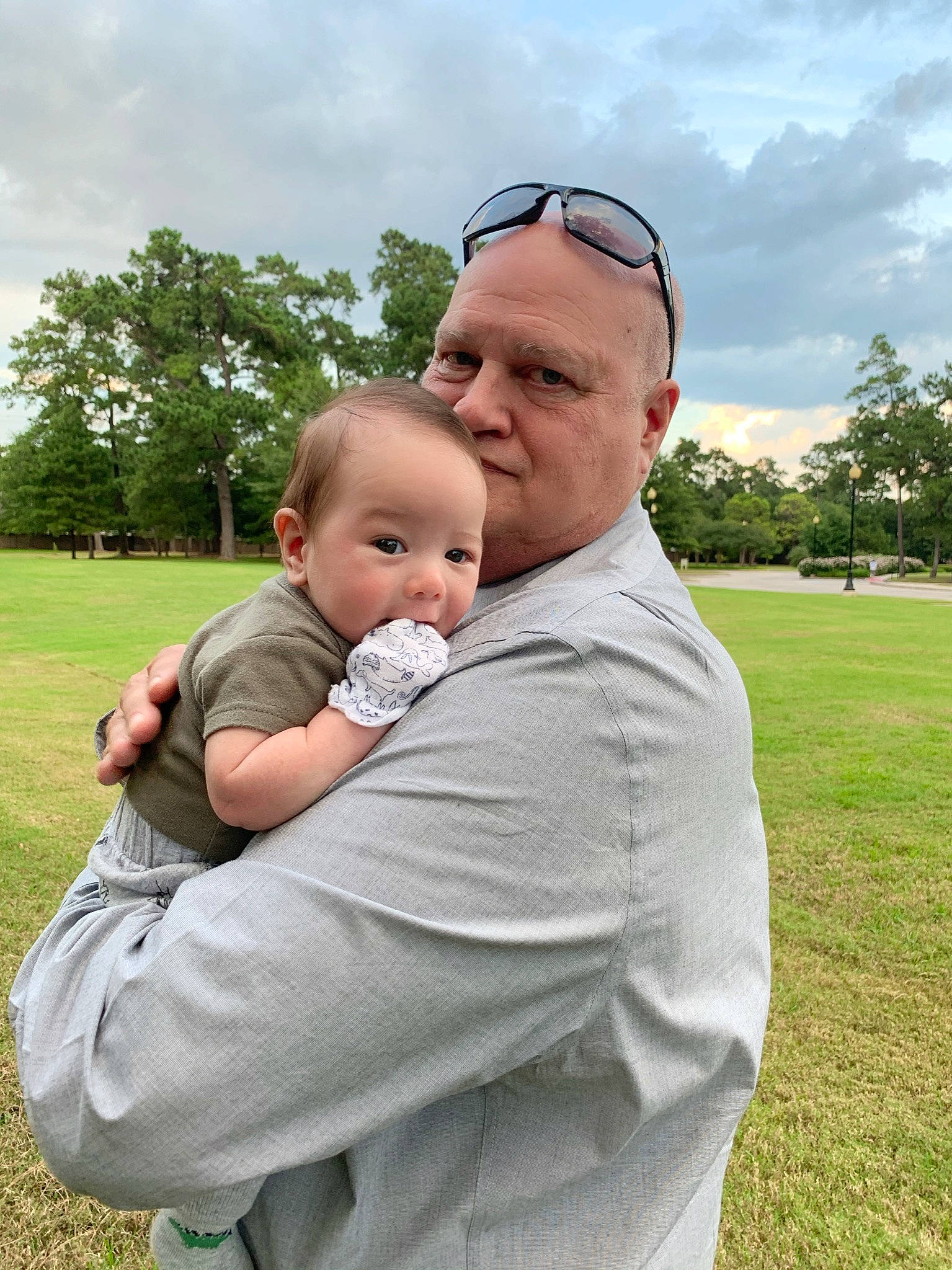 Todd is registered to the contest to win money with this photo: baby, child, family, gesture, grass, grass_family, happy, hug, interaction, lawn, meadow, people, person, photography, smile, toddler, vacation