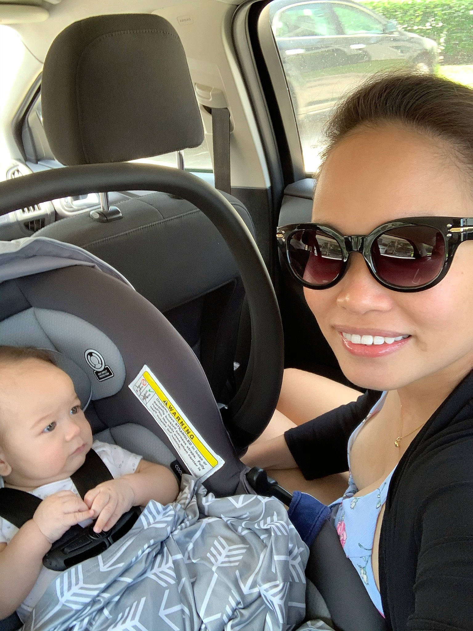 Todd is registered to the contest to win money with this photo: auto_part, baby_in_car_seat, car, car_seat, car_seat_cover, child, driving, eyewear, family_car, glasses, head_restraint, joy, person, seat_belt, steering_wheel, sunglasses, vehicle, vision_care
