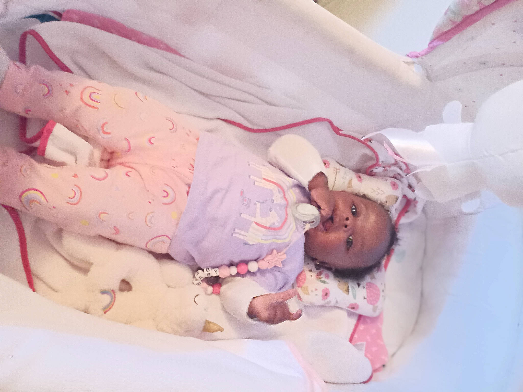 Reijanae is registered to the contest to win money with this photo: baby, baby_products, baby_safety, baby_sleeping, baby_toddler_clothing, bed, bedding, bedtime, child, comfort, event, linens, magenta, pattern, person, pink, product, room, skin, textile