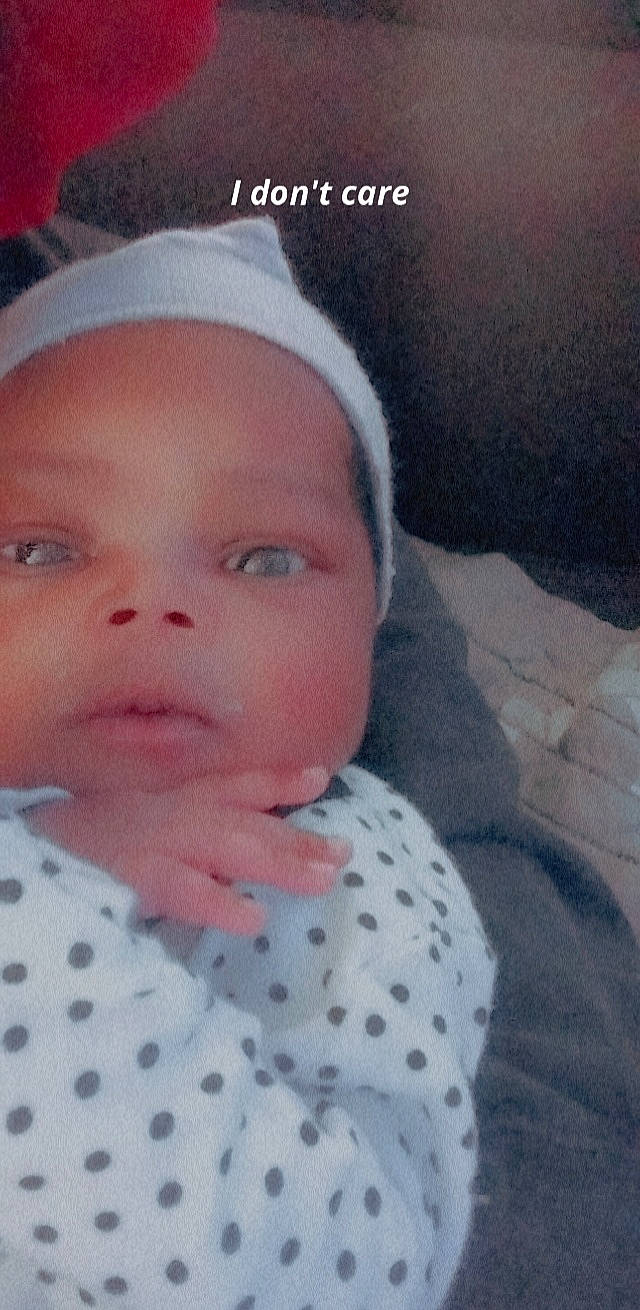 Zakiya is registered to the contest to win money with this photo: baby, baby_toddler_clothing, cap, cheek, child, chin, cloud, comfort, cool, fun, happy, knit_cap, linens, lip, nose, outerwear, pattern, person, sleeve, toddler