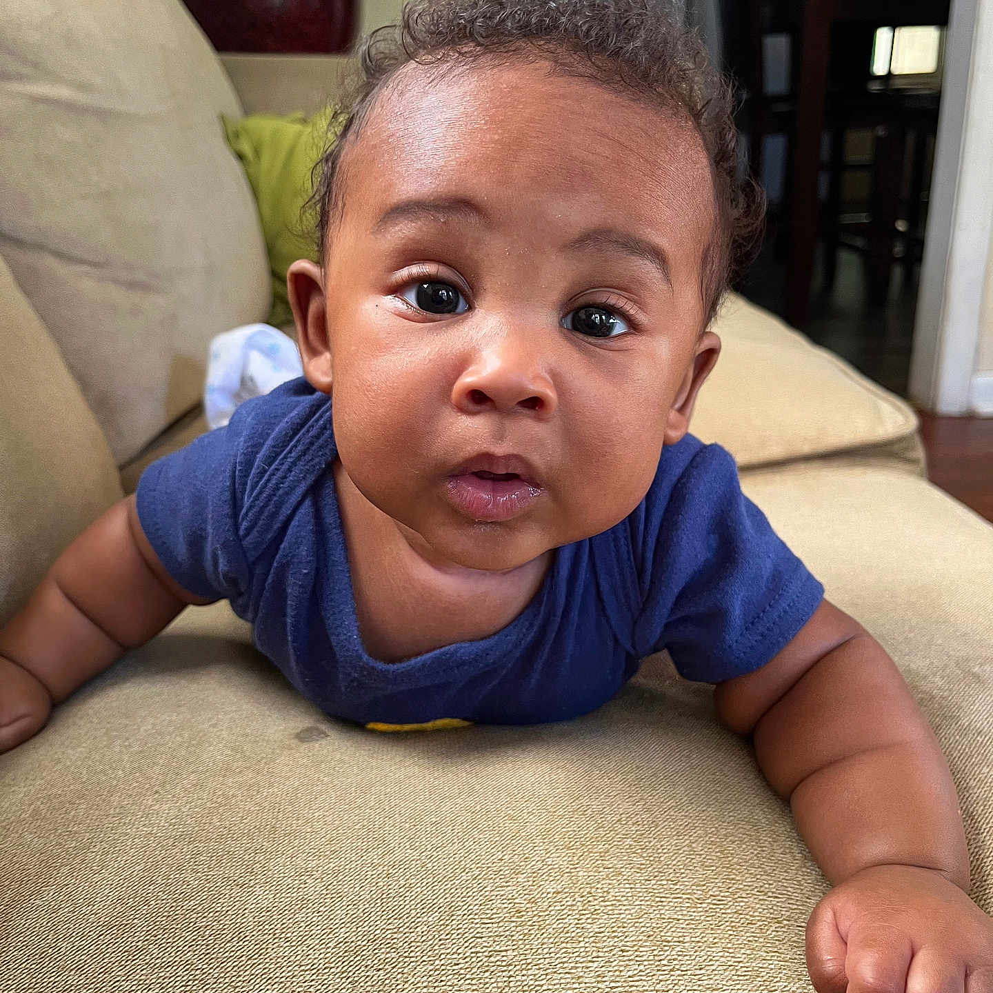 Jakarri is registered to the contest to win money with this photo: architecture, baby, bodypart, building, chair, couch, crawling, cushion, face, finger, furniture, hand, head, homedecor, indoors, person, photography, plant, portrait, sitting