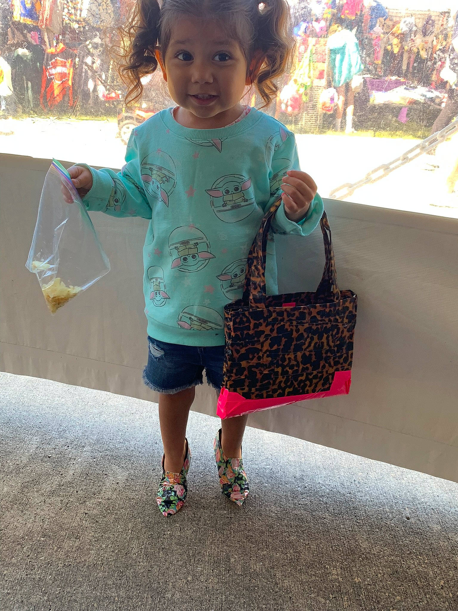 Mariana is registered to the contest to win money with this photo: child, cool, fun, happy, human_leg, joint, leisure, magenta, pattern, people, person, pink, sandal, shorts, sitting, sleeve, summer, t_shirt, toddler, vacation