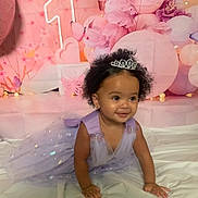 Ahnila is registered to the contest to win money with this photo: toddler, child, princess, tiara, dress, lavender, crawling, smiling, birthday, celebration, balloons, butterflies, pink, purple, curly_hair, earrings, white_sheet, background, happy, cute