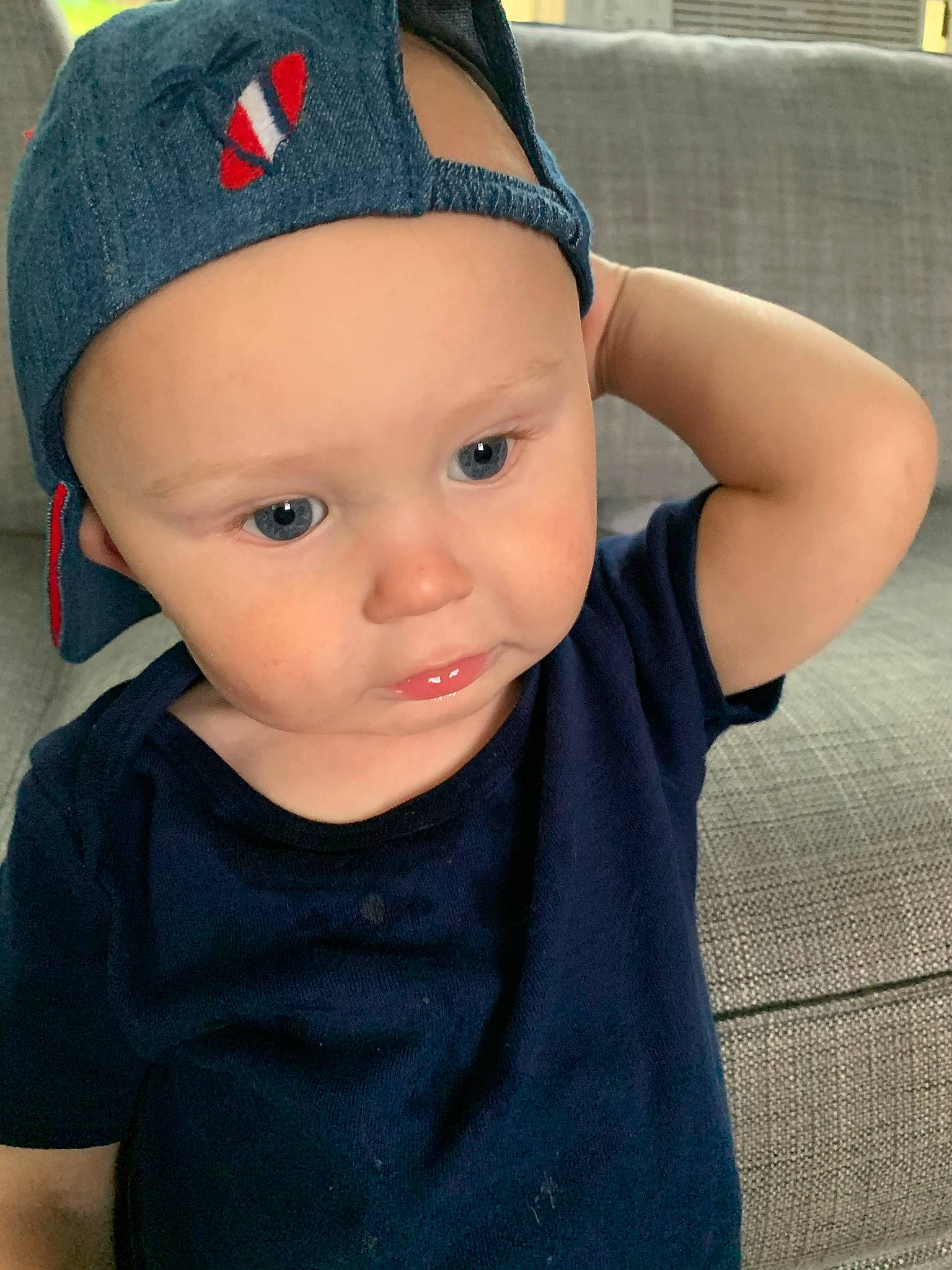 Hunter is registered to the contest to win money with this photo: baby, baby_toddler_clothing, beanie, cap, cheek, child, costume_accessory, costume_hat, electric_blue, eye, fashion_accessory, happy, headgear, headwear, knit_cap, lip, pattern, person, portrait_photography, sleeve