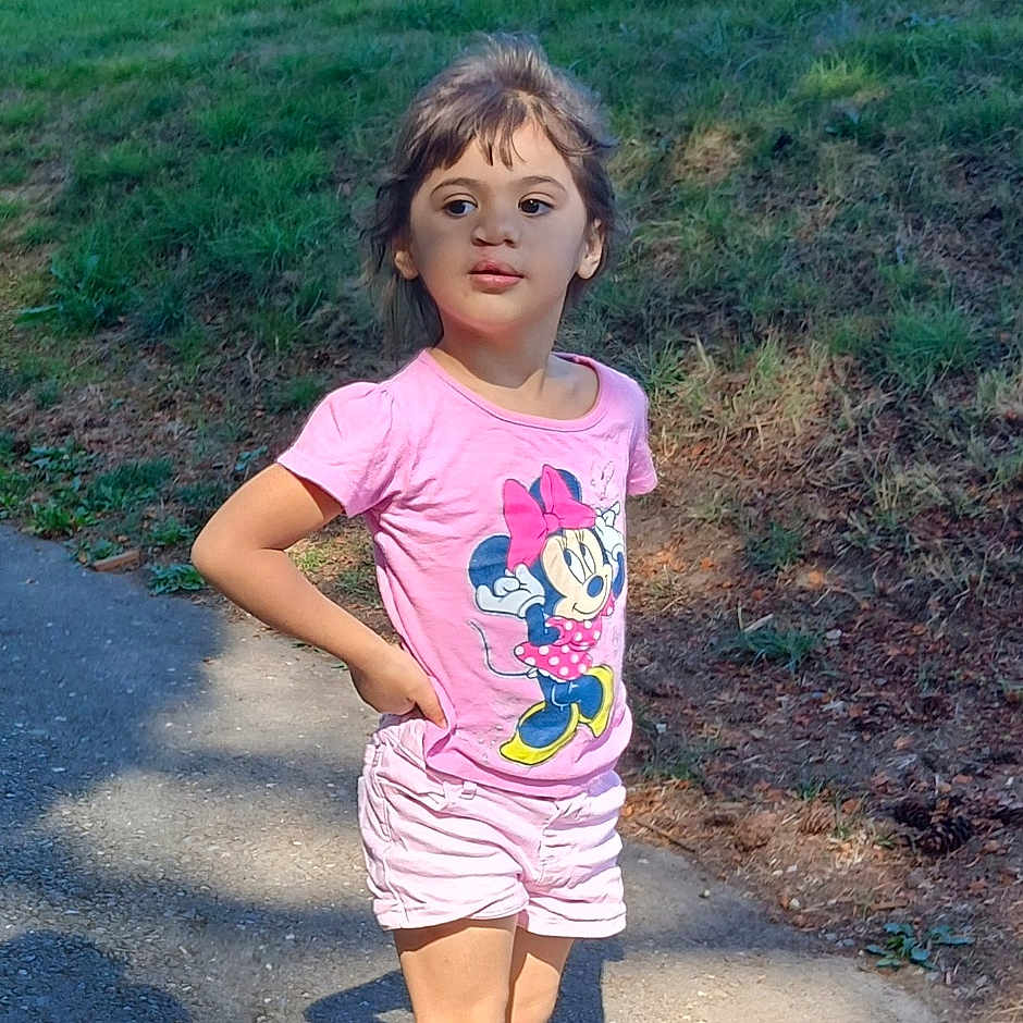 Miracle is registered to the contest to win money with this photo: clothing, face, footwear, grass, head, nature, outdoors, park, path, person, photography, plant, portrait, shoe, shorts, summer, t_shirt, tree, vegetation, walking