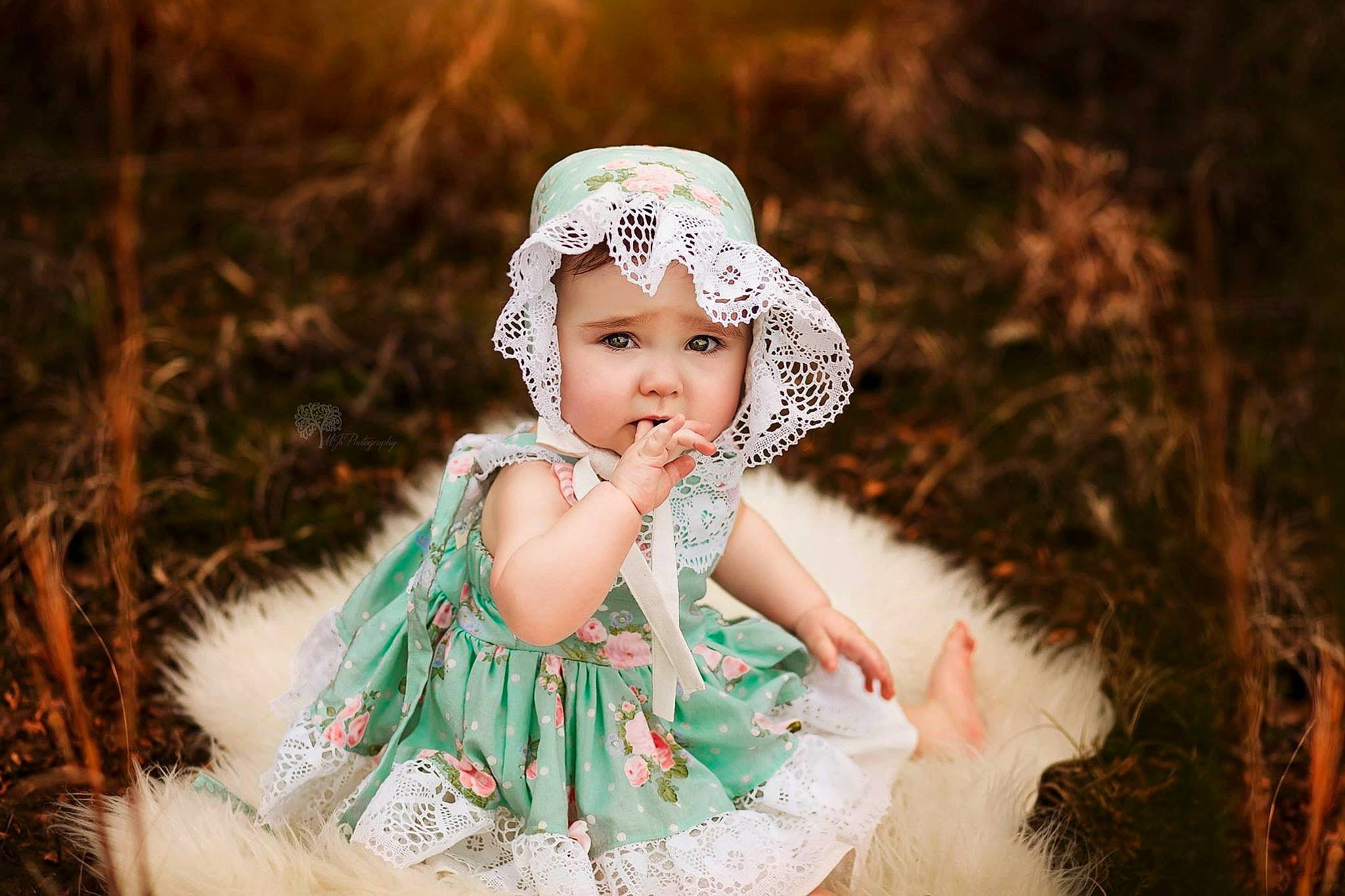 Brenna is registered to the contest to win money with this photo: baby, child, child_model, costume, dress, fashion_accessory, fun, hair_accessory, headgear, headpiece, headwear, person, photo_shoot, photograph, photography, portrait_photography, smile, toddler