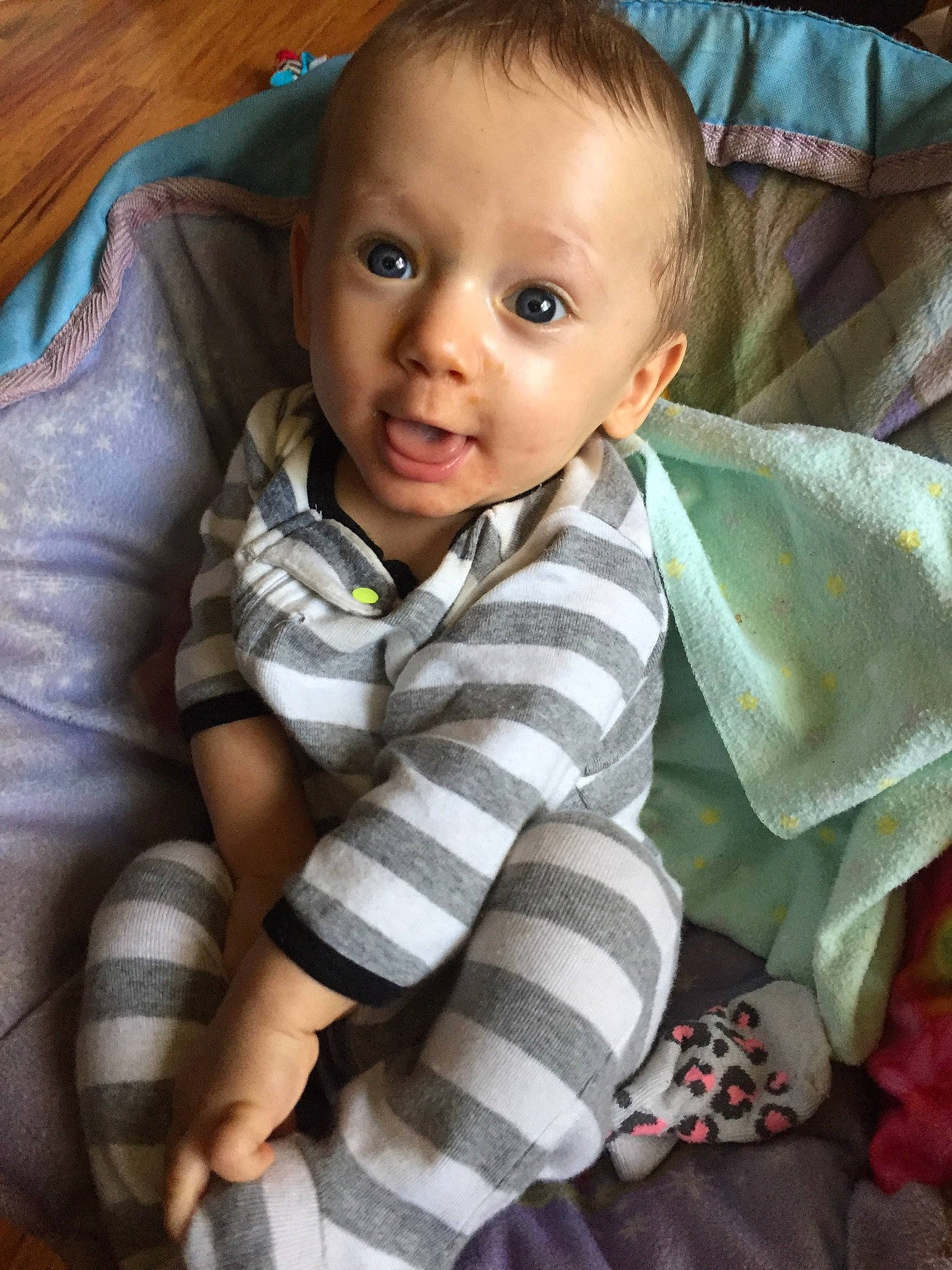 Sawyer is registered to the contest to win money with this photo: baby, cheek, child, eye, face, head, iris, nose, person, sitting, skin, smile, toddler