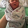 Oaklee is registered to the contest to win money with this photo: baby, bed, blanket, care, clothing, cute, footprints, hand, hospital, indoor, infant, newborn, person, portrait, resting, sleepy, soft, swaddled, tender, wrapped