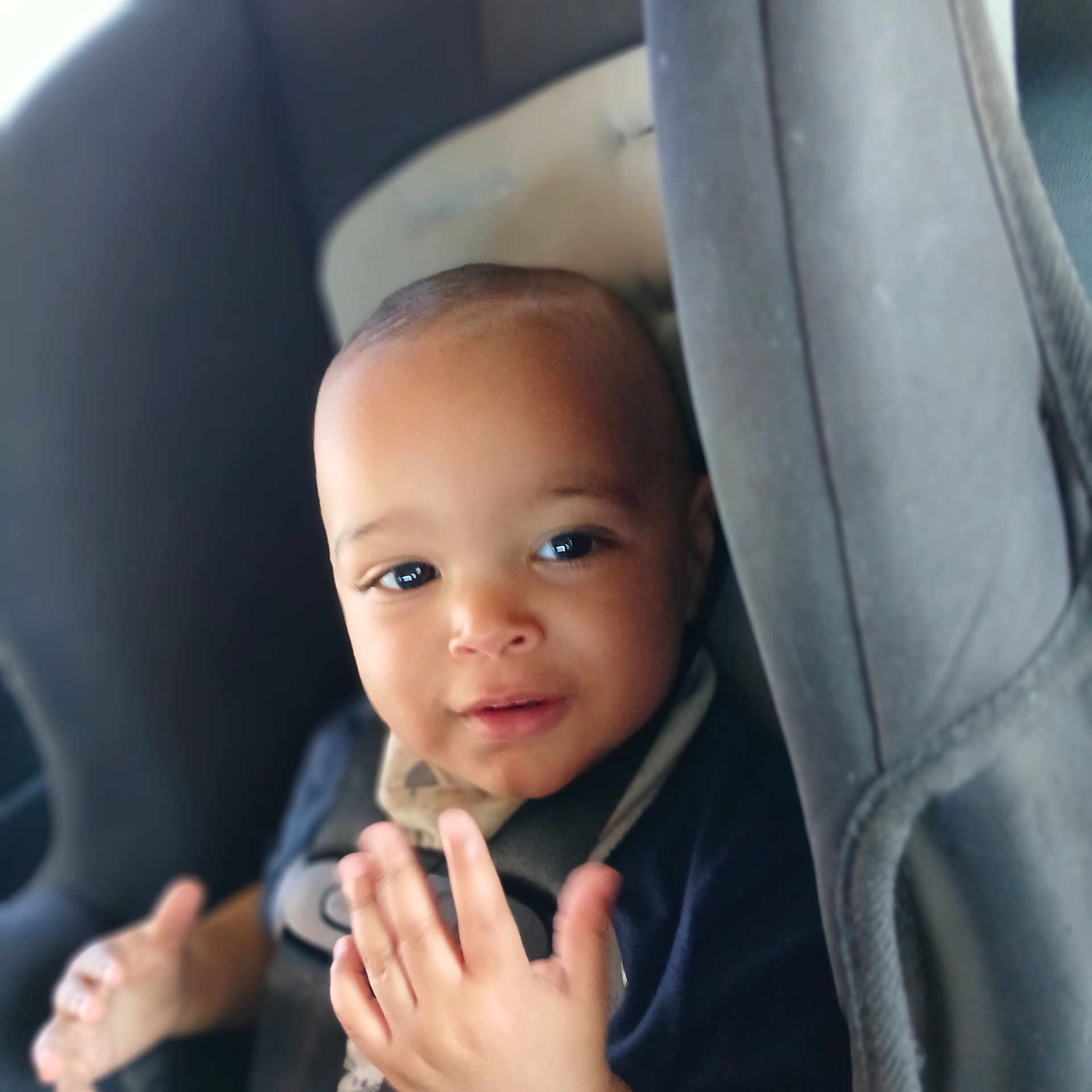 Jagger is registered to the contest to win money with this photo: baby, bodypart, car, car_interior, cushion, face, finger, hand, happy, head, headrest, homedecor, newborn, person, photography, portrait, smile, transportation, vehicle, wrist