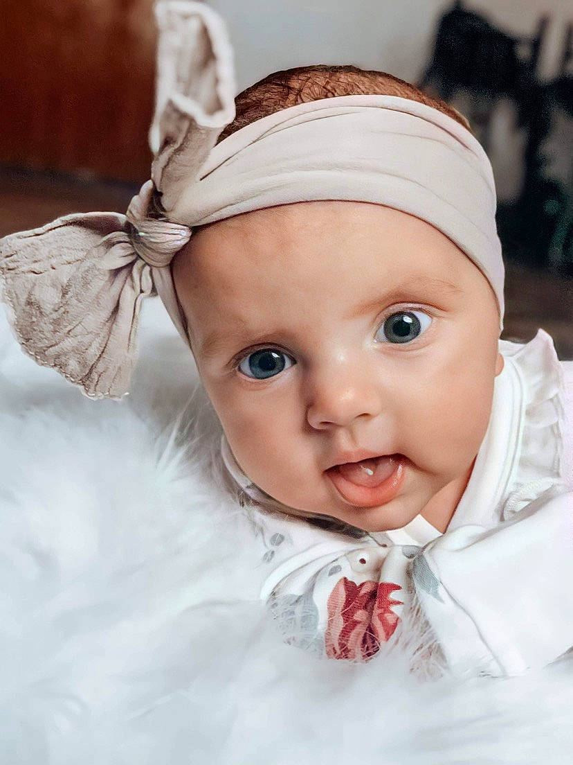 Indie joined the competition — help win amazing prizes! baby, baby_toddler_clothing, child, costume_hat, dress, event, eye, flash_photography, happy, head, headband, headgear, headpiece, headwear, iris, lip, person, skin, sleeve, toddler
