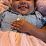 De'Lysia joined the competition — help win amazing prizes! baby, infant, smiling, face, headband, bow, denim, pink_skirt, blanket, hand, cute, child, clothing, portrait, happy, toddler, soft_texture, closeup, indoors, person