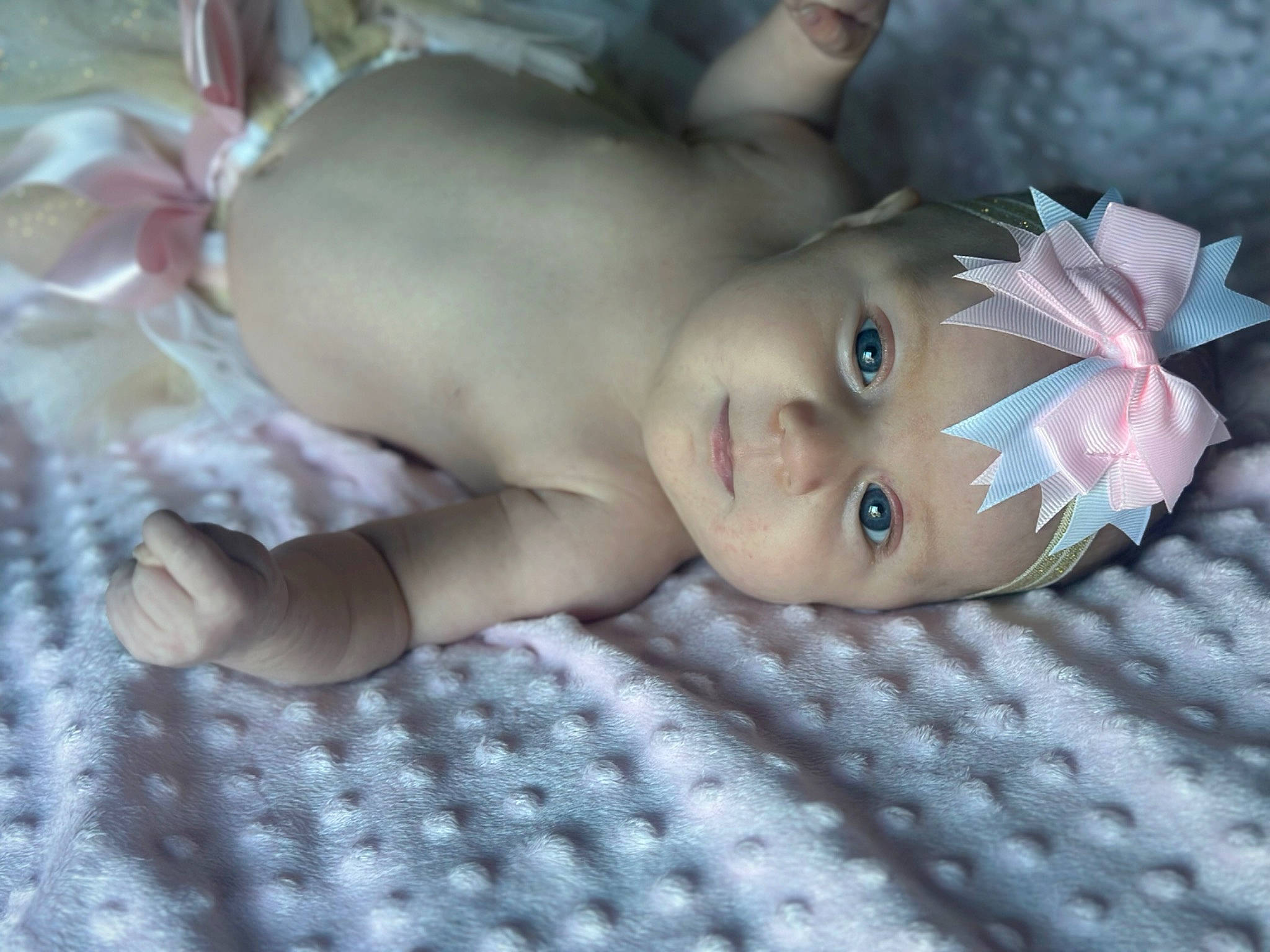 Adalyn is registered to the contest to win money with this photo: baby, cheek, child, doll, eye, eyebrow, eyelash, fashion_accessory, fawn, fur, grass, headwear, human_body, iris, lip, nose, pattern, person, pink, skin