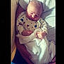 newborn, baby, blanket, sleeping, infant, person, hands, clothing, cute, cozy, indoor, soft, peaceful, resting, wrapped, child, human, portrait, holding, adorable