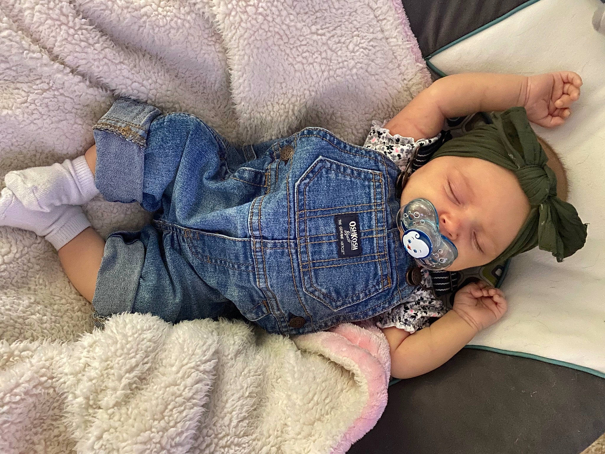 Mena joined the competition — help win amazing prizes! arm, baby, baby_toddler_clothing, comfort, couch, denim, electric_blue, finger, glasses, hand, headwear, joint, leg, person, plant, purple, sitting, skin, sleeve, thigh