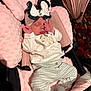 Amelia is registered to the contest to win money with this photo: baby, infant, sleeping, stroller, pink, headband, bow, clothing, cozy, cute, soft, cushion, newborn, child, portrait, resting, indoor, toddler, small_hands, peaceful