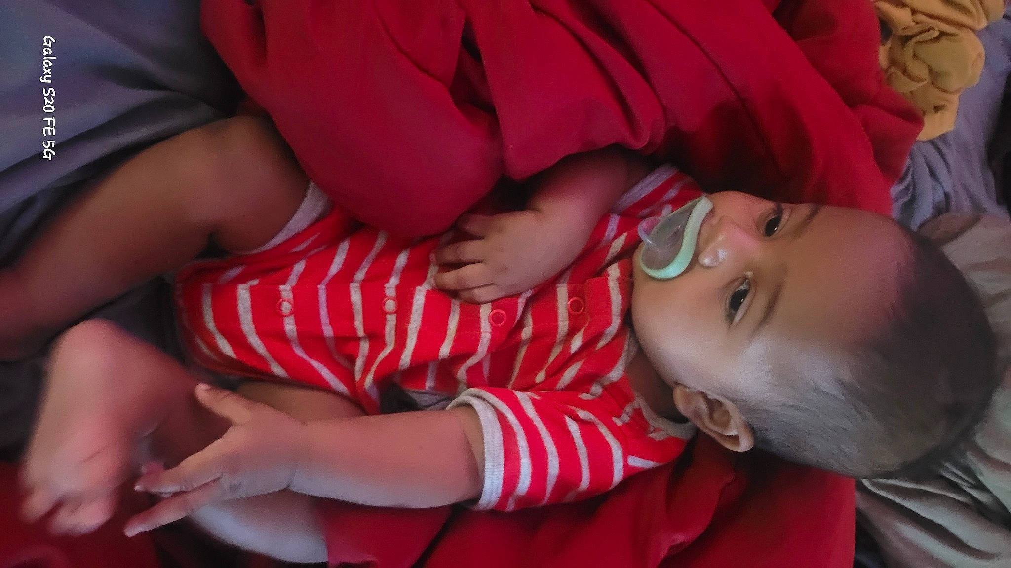 Azriel is registered to the contest to win money with this photo: baby, baby_toddler_clothing, cheek, comfort, facial_expression, fun, gesture, hand, human_body, iris, lip, mouth, nose, person, pink, product, skin, smile, textile, toddler