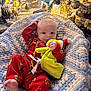 Tommy joined the competition — help win amazing prizes! baby, child, christmas_tree, christmas_ornaments, crocheted_blanket, plush_toy, grinch_pajamas, festive, holiday, smiling, indoors, cozy, decorations, lights, red_clothing, green_toy, infant, cute, holiday_season, relaxing