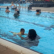 Melody is registered to the contest to win money with this photo: adult, baby, blue, child, daytime, family, fun, hat, outdoor, people, pool, recreation, relaxation, steps, summer, sunglasses, swimming, swimsuit, vacation, water