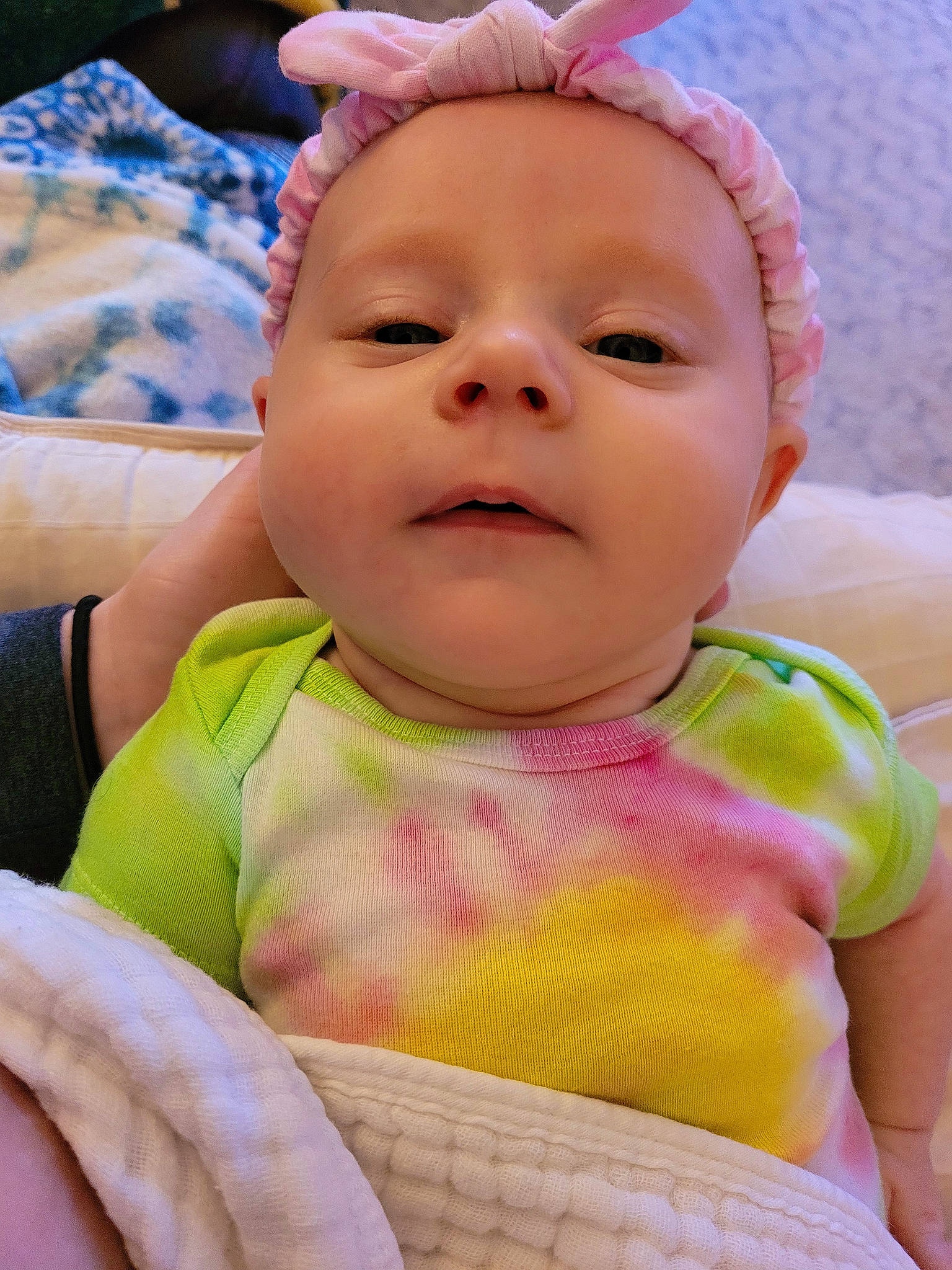 Maddie is registered to the contest to win money with this photo: baby, baby_toddler_clothing, cheek, child, dress, eyebrow, eyelash, face, happy, headgear, iris, lip, mouth, nose, person, pink, skin, smile, textile, toddler