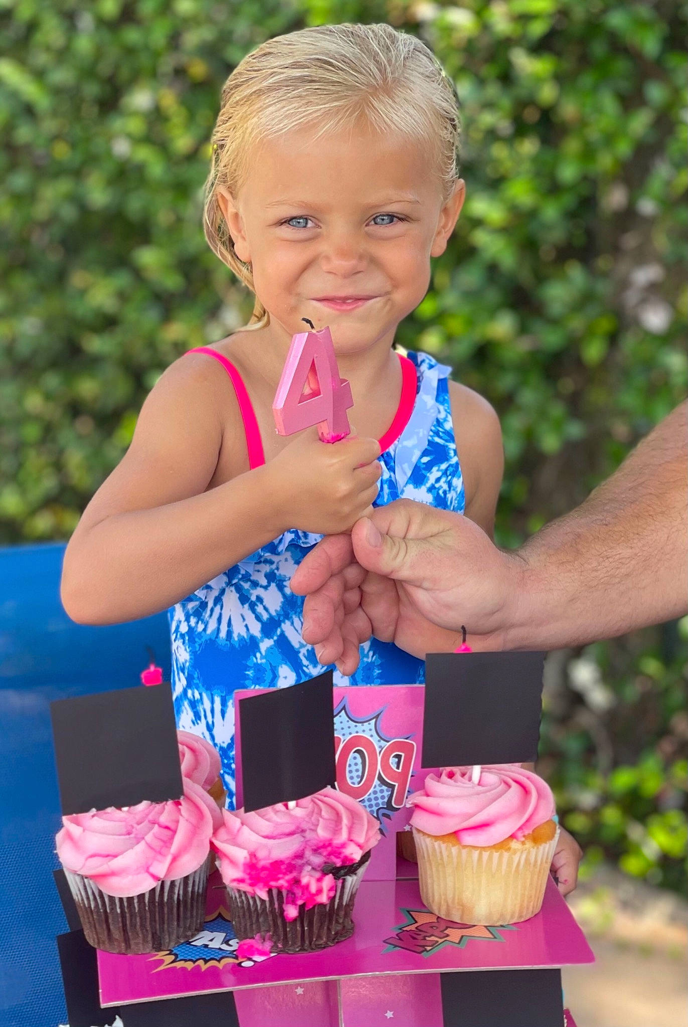 Stella is registered to the contest to win money with this photo: baked_goods, beauty, blue, cake, cake_decorating, cake_decorating_supply, cuisine, food, fun, happy, joy, leisure, people, people_in_nature, person, photograph, pink, recreation, shorts, smile