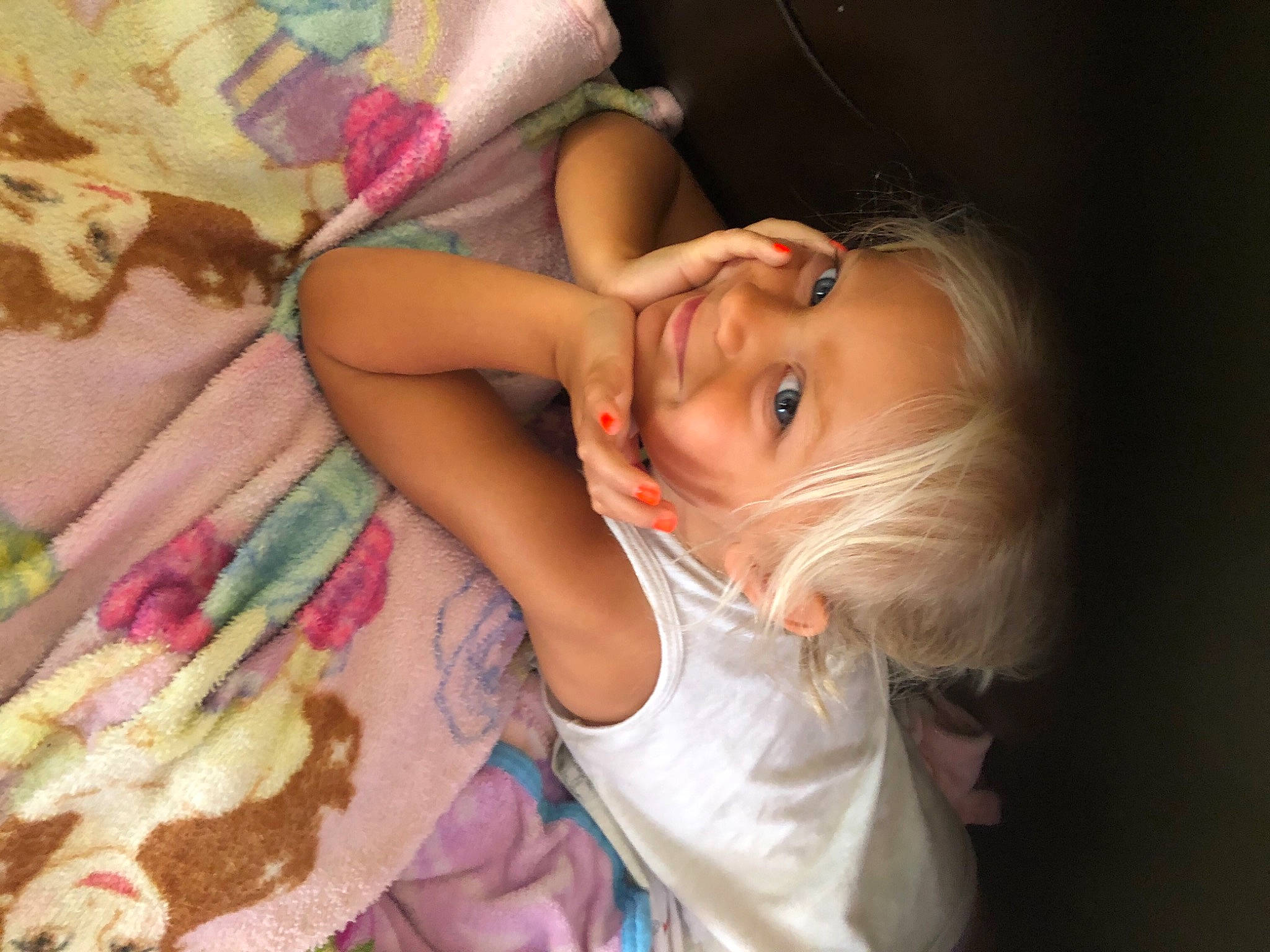 Stella is registered to the contest to win money with this photo: arm, baby_toddler_clothing, cheek, dress, eye, eyelash, facial_expression, finger, hand, happy, head, human_body, iris, joy, lip, mouth, nose, person, pink, skin