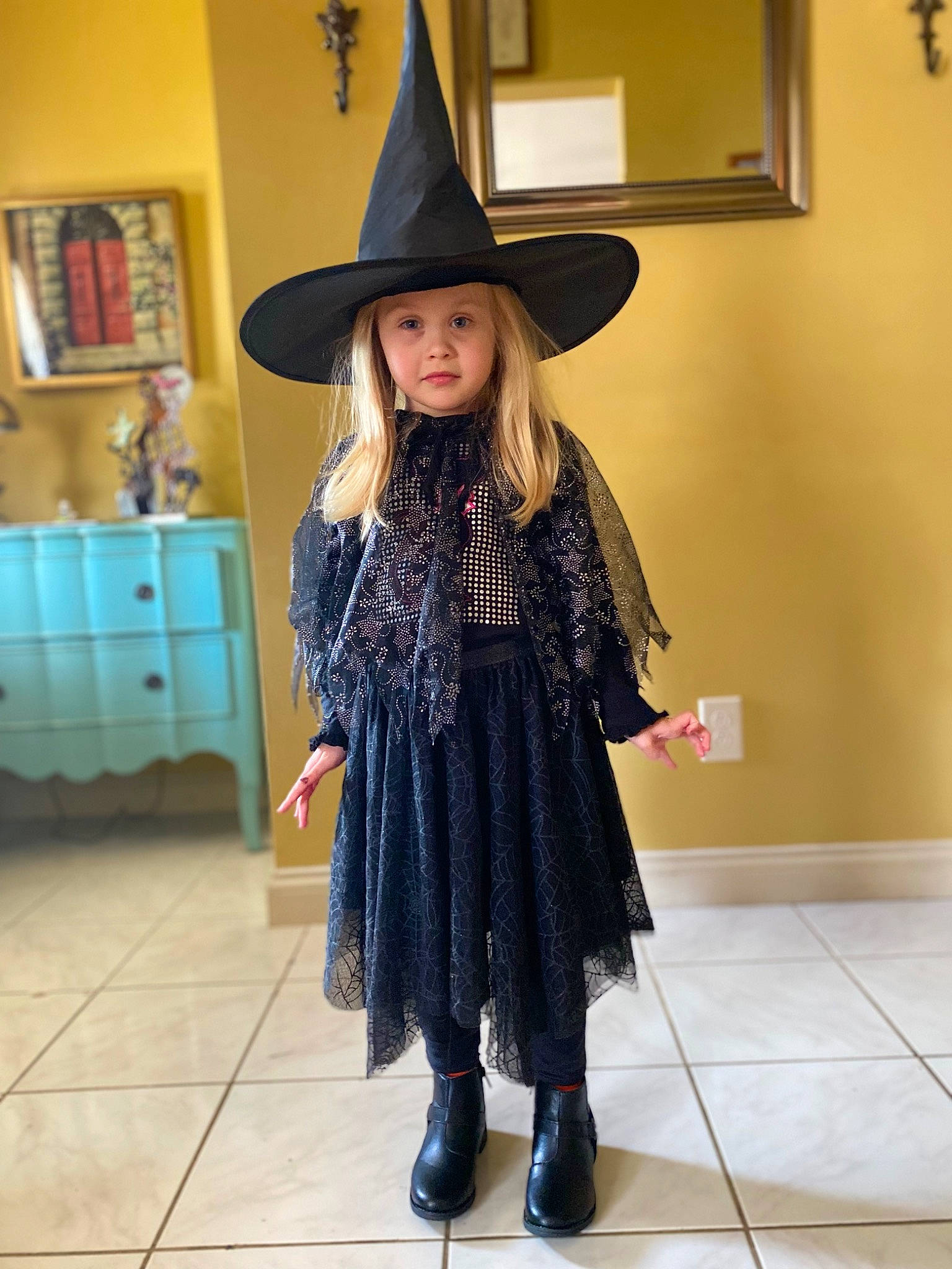 Lexi joined the competition — help win amazing prizes! cabinetry, chest_of_drawers, child, costume_hat, drawer, dresser, event, fashion_design, flooring, hairstyle, hat, headwear, long_hair, person, sleeve, street_fashion, sun_hat, thigh, toddler, trunk
