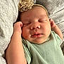 Emory is registered to the contest to win money with this photo: accessories, baby, bed, blanket, bonnet, clothing, cushion, face, furniture, glove, hat, head, homedecor, newborn, person, photography, portrait, quilt, sleeping