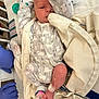 newborn, baby, hospital, medical_equipment, gloves, blanket, onesie, infant, monitoring, bed, healthcare, patient, foot, arm, face, person, cute, sleeping, child, care
