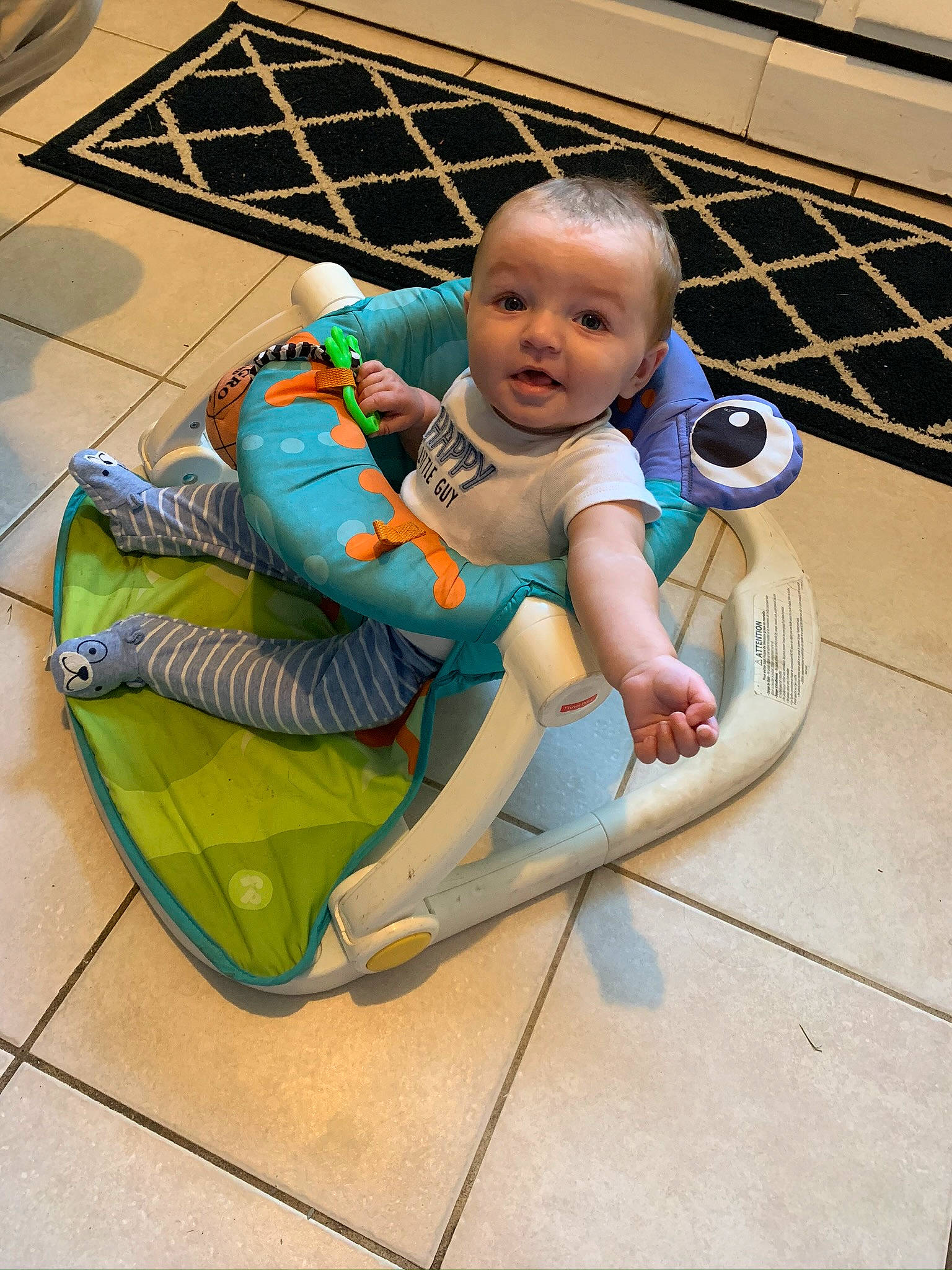 Wesley joined the competition — help win amazing prizes! ankle, aqua, baby, baby_products, baby_toddler_clothing, baby_toys, child, comfort, foot, lap, person, play, slipper, surprise, tile, toddler, walking_shoe
