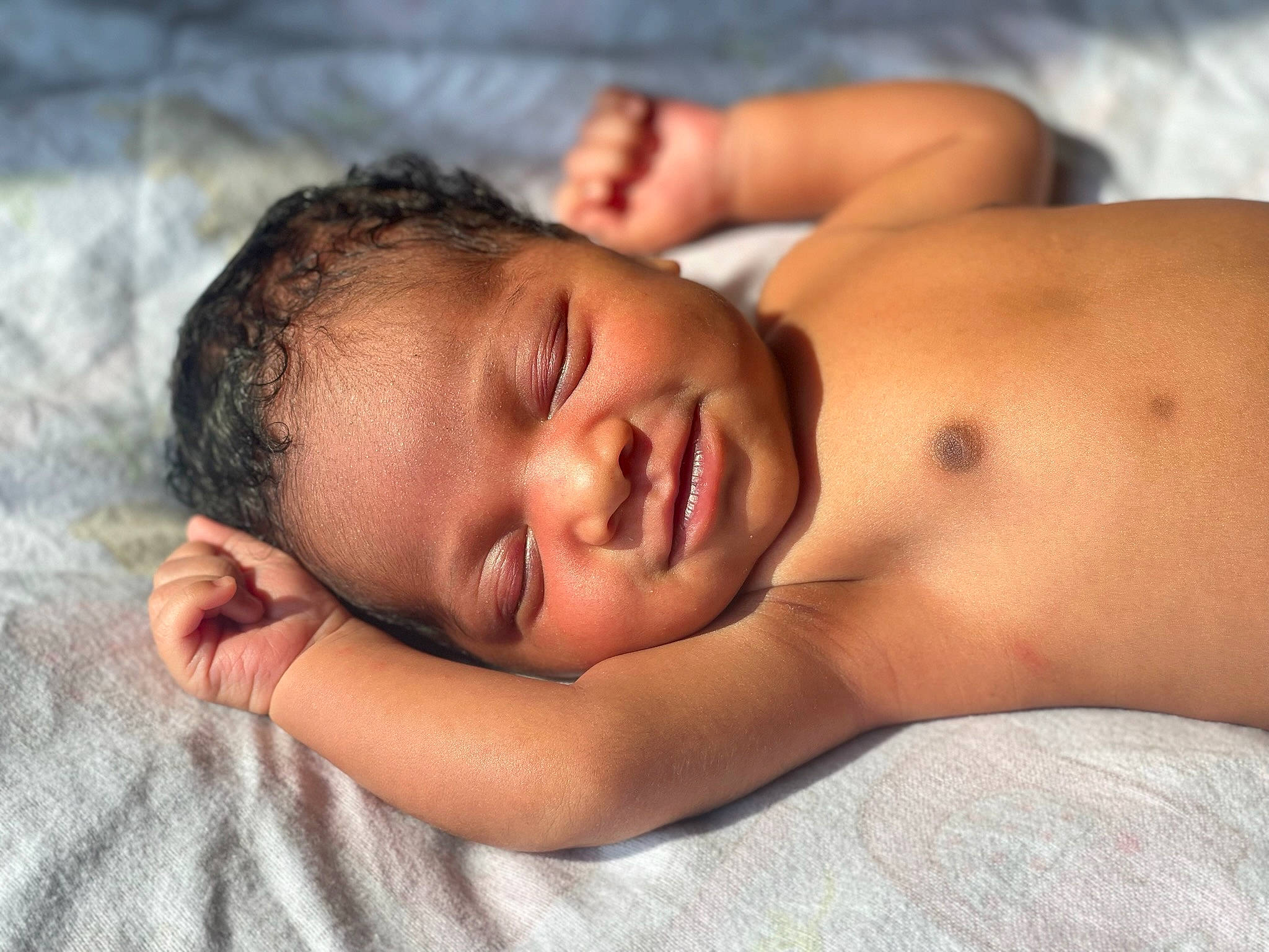 Iyanna is registered to the contest to win money with this photo: abdomen, arm, baby, black_hair, cheek, chest, comfort, eye, flash_photography, hand, happy, head, human_body, lip, mouth, neck, nose, person, skin, stomach
