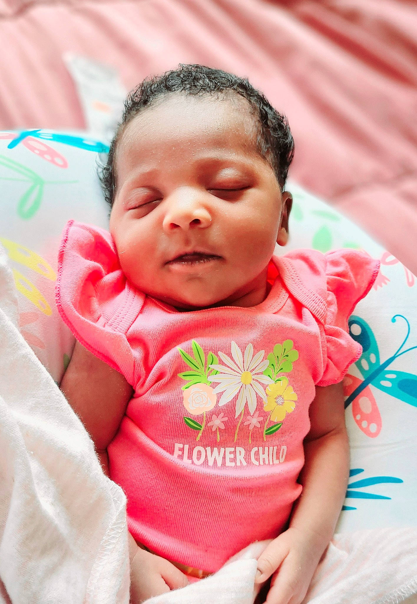 Iyanna is registered to the contest to win money with this photo: baby, baby_toddler_clothing, cheek, child, chin, close_up, comfort, fun, grass, happy, head, leisure, lip, mouth, neck, nose, person, skin, sleeve, smile