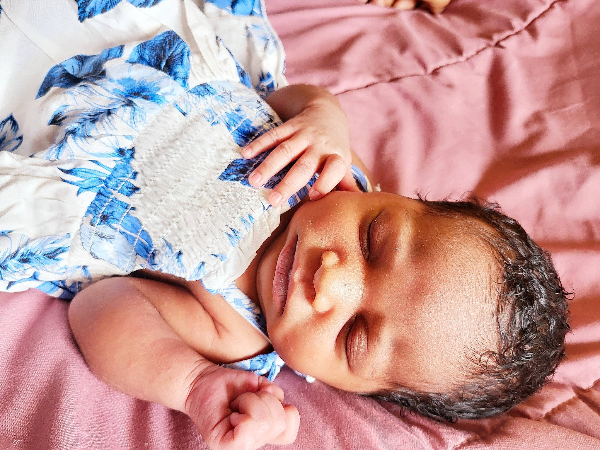 Iyanna is registered to the contest to win money with this photo: baby, baby_toddler_clothing, bedtime, blue, cheek, chest, child, comfort, eyelash, finger, gesture, happy, mammal, nail, nose, pattern, person, product, skin, thumb