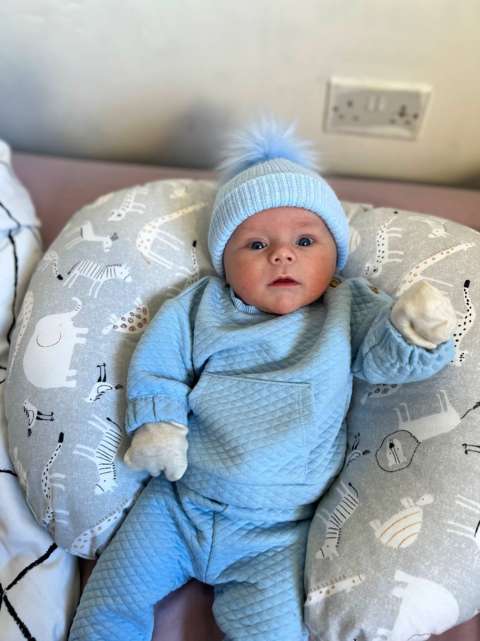 Arthur joined the competition — help win amazing prizes! baby, baby_products, baby_sleeping, baby_toddler_clothing, beanie, cap, cheek, child, comfort, eye, fashion_accessory, headgear, headwear, knit_cap, linens, person, room, sitting, skin, textile