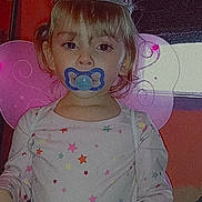Deonna is registered to the contest to win money with this photo: accessories, baby, clothing, costume, crown, earring, face, head, jewelry, lady, necklace, people, person, photography, portrait, purple, sleeve, t_shirt, tiara, turquoise