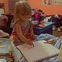 Deonna is registered to the contest to win money with this photo: baby, book, clothing, crayon, desk, face, footwear, furniture, head, indoors, paintcontainer, pencil, person, photography, portrait, publication, reading, shoe, student, table