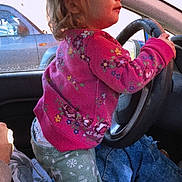 Juliet is registered to the contest to win money with this photo: alloywheel, baby, car, carwheel, clothing, coat, cushion, face, head, homedecor, jacket, jeans, machine, pants, person, photography, portrait, spoke, transportation, vehicle