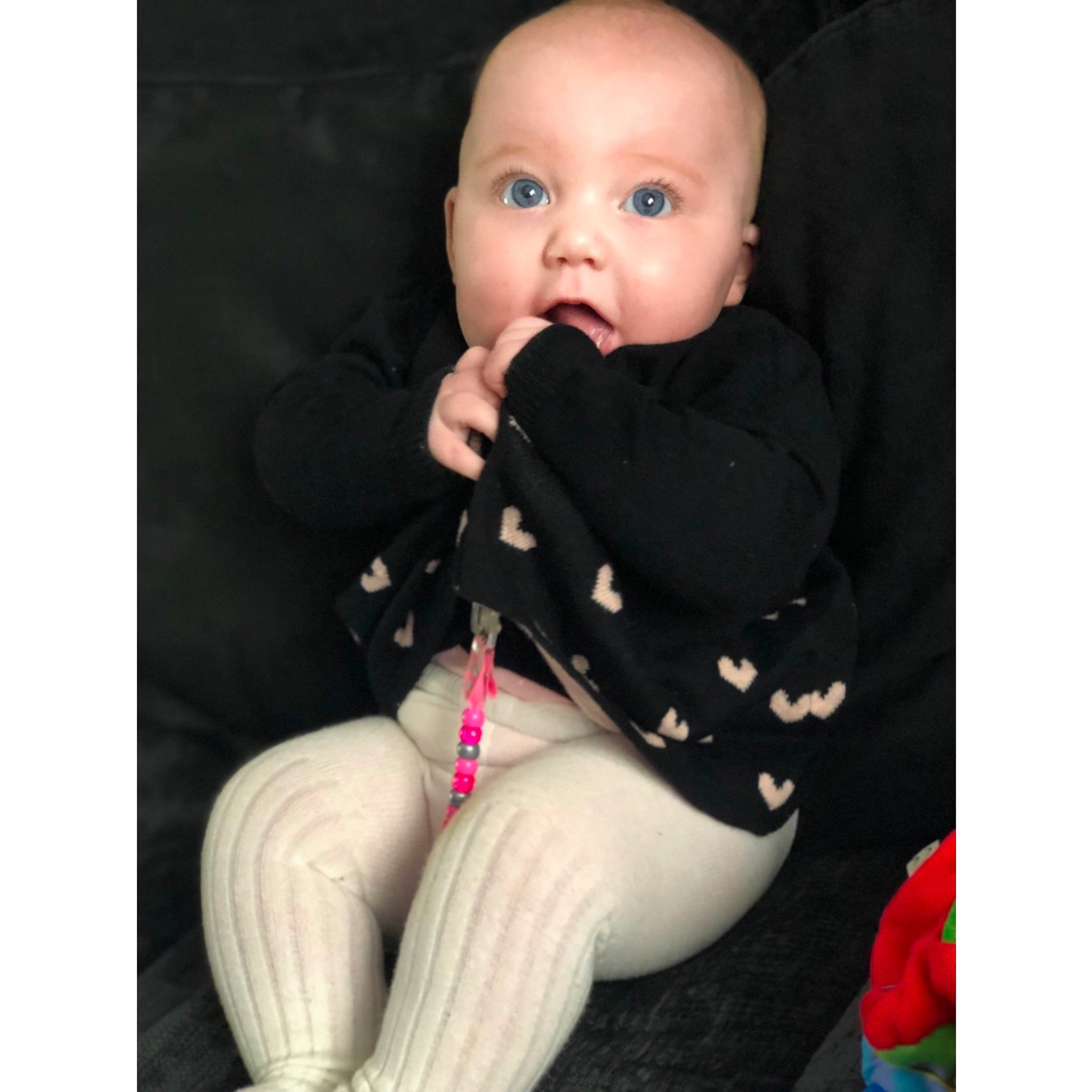 Daisy-may joined the competition — help win amazing prizes! arm, baby, beauty, cheek, child, face, footwear, head, joint, leg, lip, mouth, nose, person, pink, product, shoe, sitting, skin, surprise