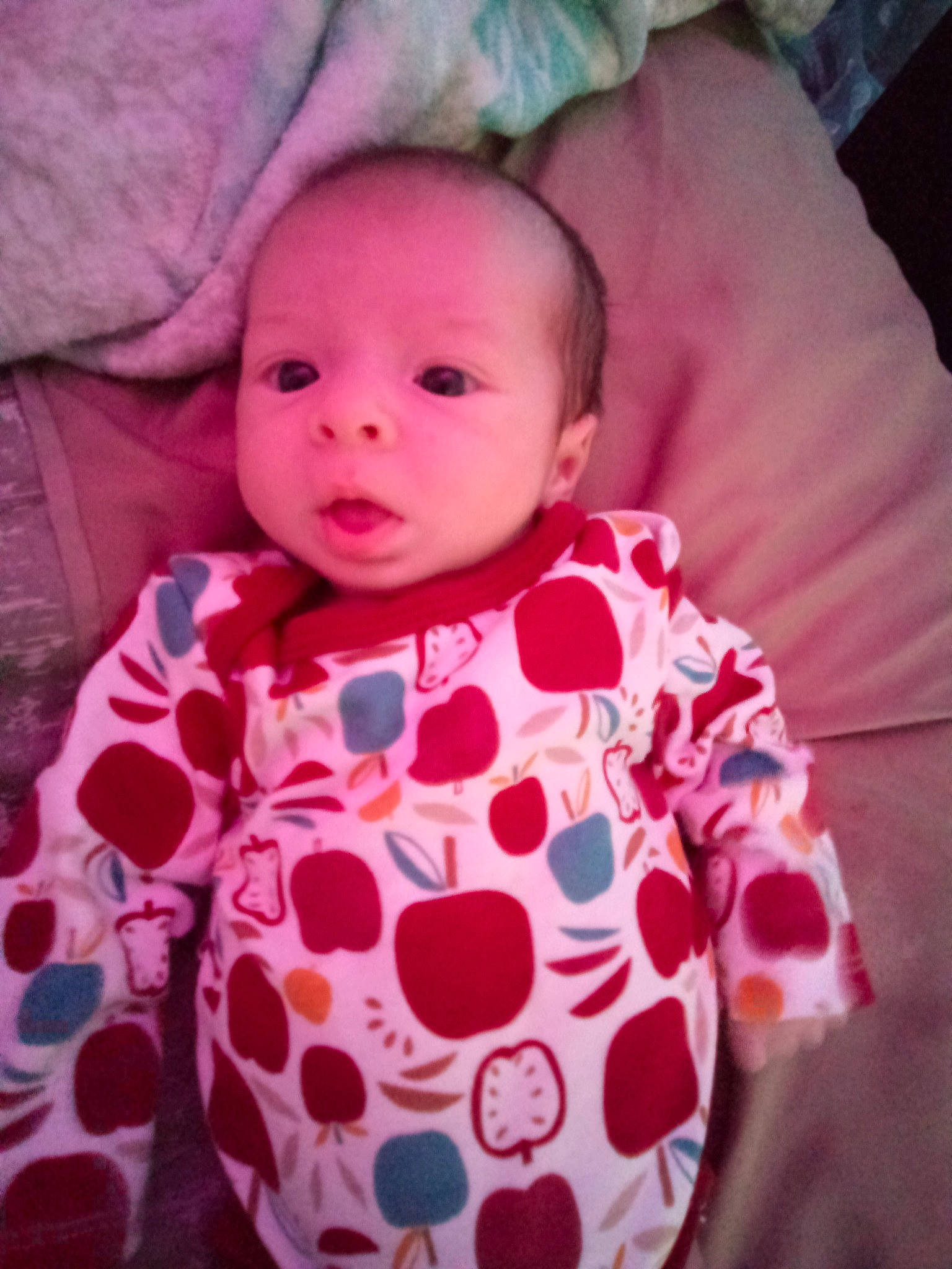 Elsa is registered to the contest to win money with this photo: baby, baby_toddler_clothing, cheek, comfort, dress, eye, face, facial_expression, head, iris, lip, mammal, neck, nose, outerwear, person, pink, skin, sleeve, textile